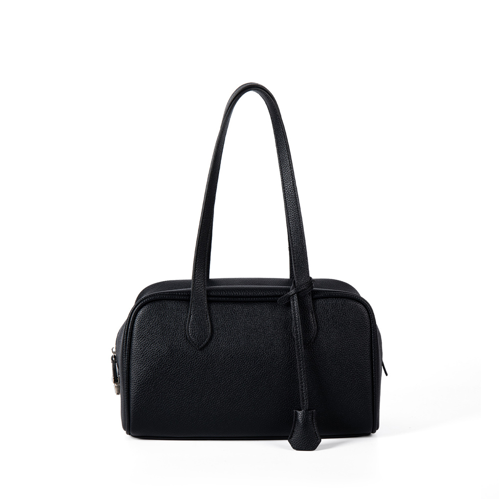 A black pebbled vegan leather Boston bag with long shoulder straps, a top zipper, and a matching leather clochette.