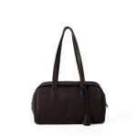 A black pebbled vegan leather Boston bag with long shoulder straps, a top zipper, and a matching leather clochette. Additional product view 2.