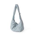 A blush pink padded polyester crescent shoulder bag with a wide adjustable strap and silver zipper, isolated on white. Additional product view 2.