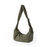 A blush pink padded polyester crescent shoulder bag with a wide adjustable strap and silver zipper, isolated on white. Additional product view 6.