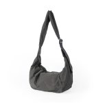A blush pink padded polyester crescent shoulder bag with a wide adjustable strap and silver zipper, isolated on white. Additional product view 7.