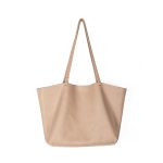 A slouchy black pebbled vegan leather tote with long thin shoulder straps and an open trapezoid silhouette. Additional product view 4.