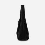 A matte black faux suede hobo bag with a slouchy triangular silhouette and a wide integrated shoulder strap. Additional product view 6.