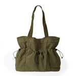 A black crinkled nylon shopper tote with webbing straps and a mid-body drawstring that creates a ruched gathered shape. Additional product view 2.