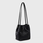 A black woven vegan leather bucket shoulder bag with matching tubular straps and a tight diagonal intrecciato weave. Additional product view 5.