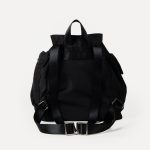 A small black nylon backpack with a drawstring flap, translucent buckle, angled front pocket, and webbing shoulder straps. Additional product view 7.