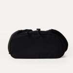 A small black nylon backpack with a drawstring flap, translucent buckle, angled front pocket, and webbing shoulder straps. Additional product view 8.