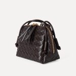 A dark espresso brown woven vegan leather mini dome crossbody with thin knotted cord straps and a gold-tone zipper. Additional product view 8.