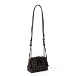 A dark espresso brown woven vegan leather mini dome crossbody with thin knotted cord straps and a gold-tone zipper.