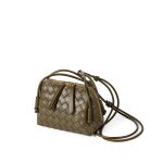 A dark espresso brown woven vegan leather mini dome crossbody with thin knotted cord straps and a gold-tone zipper. Additional product view 2.