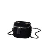 A small black quilted faux suede vanity box bag with dual silver zippers and a chain strap interwoven with black cord. Additional product view 2.