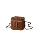 A small black quilted faux suede vanity box bag with dual silver zippers and a chain strap interwoven with black cord. Additional product view 4.