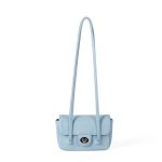 A dusty pink pebbled vegan leather baguette with a silver turn-lock flap and two long thin shoulder straps. Additional product view 2.