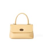 A dark brown glossy vegan leather top-handle flap bag with a gold-tone oval twist-lock centered on the front. Additional product view 2.