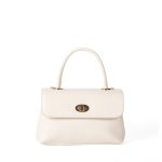 A dark brown glossy vegan leather top-handle flap bag with a gold-tone oval twist-lock centered on the front. Additional product view 5.