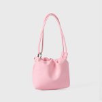 A tiny black vegan leather dumpling bag with a ruffled gathered opening and a thin tubular shoulder strap. Additional product view 7.