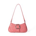 A beige woven canvas baguette with dark brown vegan leather corner patches, a center buckle strap, and a slim shoulder strap. Additional product view 2.