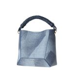 A blue geometric-patterned bucket bag with a twisted navy top handle, matching inner pouch, and detachable crossbody strap. Additional product view 2.