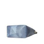 A blue geometric-patterned bucket bag with a twisted navy top handle, matching inner pouch, and detachable crossbody strap. Additional product view 4.