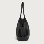 A large off-white pebbled vegan leather tote with folded winged sides, slim shoulder straps, and a gold center clasp. Additional product view 3.