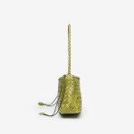 A dark brown woven vegan leather underarm bag with a thin braided strap and decorative side ties ending in leather tabs. Additional product view 7.