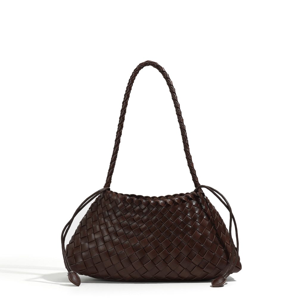 A dark brown woven vegan leather underarm bag with a thin braided strap and decorative side ties ending in leather tabs.