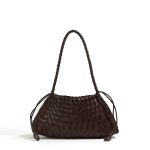 A dark brown woven vegan leather underarm bag with a thin braided strap and decorative side ties ending in leather tabs.