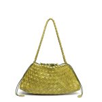 A dark brown woven vegan leather underarm bag with a thin braided strap and decorative side ties ending in leather tabs. Additional product view 4.