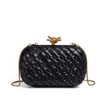 A metallic gold woven vegan leather box clutch with a knotted metal clasp and a thin gold snake-chain strap. Additional product view 3.