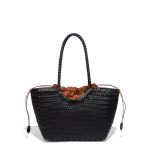 A black woven vegan leather shopper tote with braided handles and a cognac brown drawstring inner pouch.