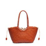 A black woven vegan leather shopper tote with braided handles and a cognac brown drawstring inner pouch. Additional product view 3.