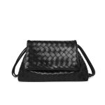 A black woven vegan leather shoulder bag with a large fold-over flap and thin tubular straps on a white background.