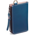 A cognac vegetable-tanned leather zip wallet with white contrast stitching, a brass D-ring, and a leather zipper pull on a white background. Additional product view 3.